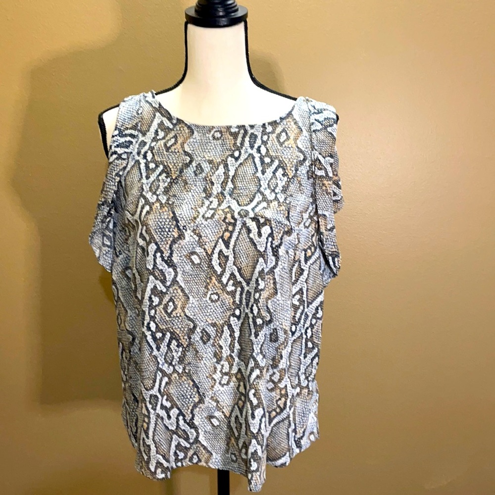 Ruffled sleeveless animal print top
